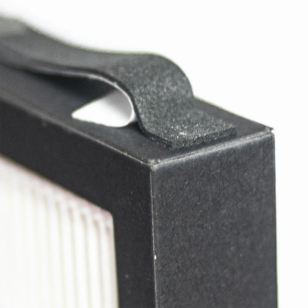 Adhesive EPDM foam is applied to the edges of the HEPA 13 filter